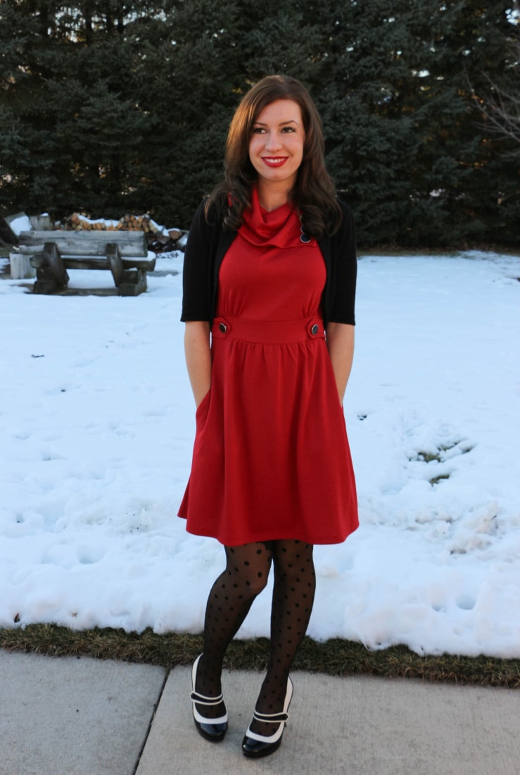 Lindsey wearing a red ModCloth dress, polka dot tights, and heels