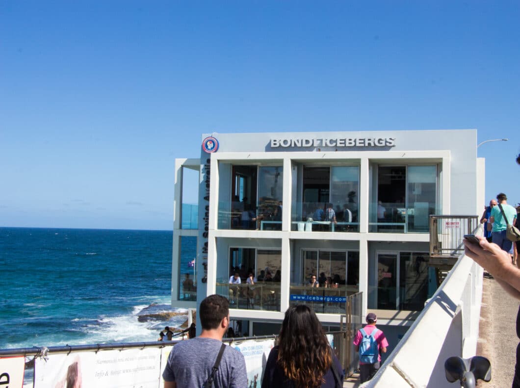 The modern exterior of Bondi Icebergs dining room and bar overlooks the Pacific Ocean at Bondi Beach in Sydney, Australia.