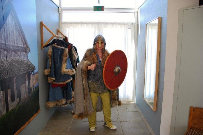 Julia getting to try some Viking garb in Denmark!