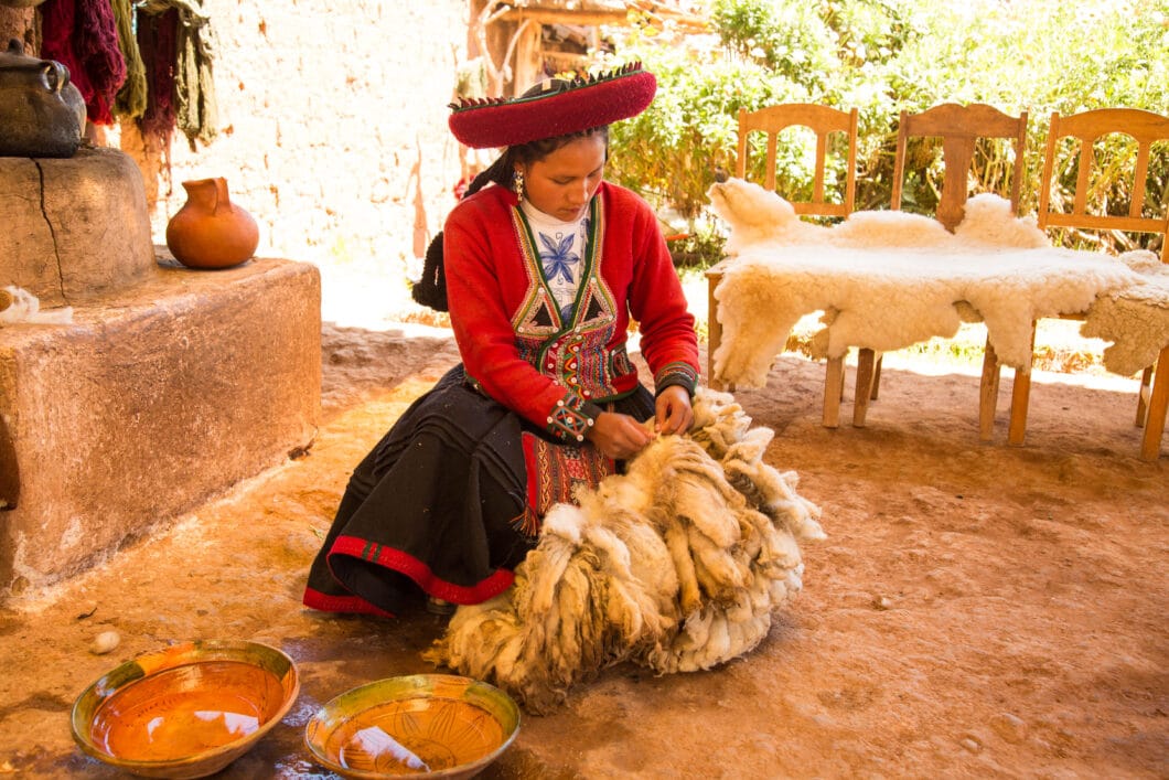 Demonstrating how they wash the wool.