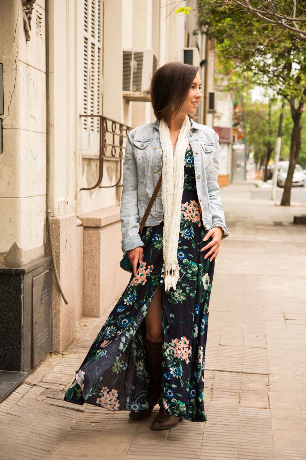 A woman wearing a Shein floral maxi dress for fall