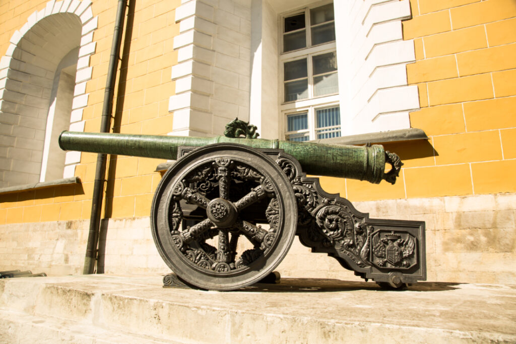 An old metal cannon on display outside of the Kremin Armoury.