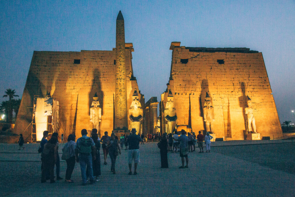 Luxor Temple at night illuminated by lights