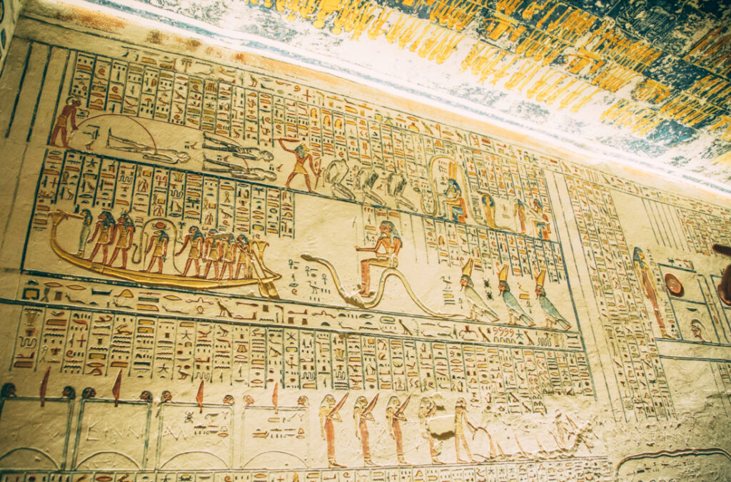 Another wall inside  the tomb of King Ramses V with ornate carvings that tell Egyptian history.