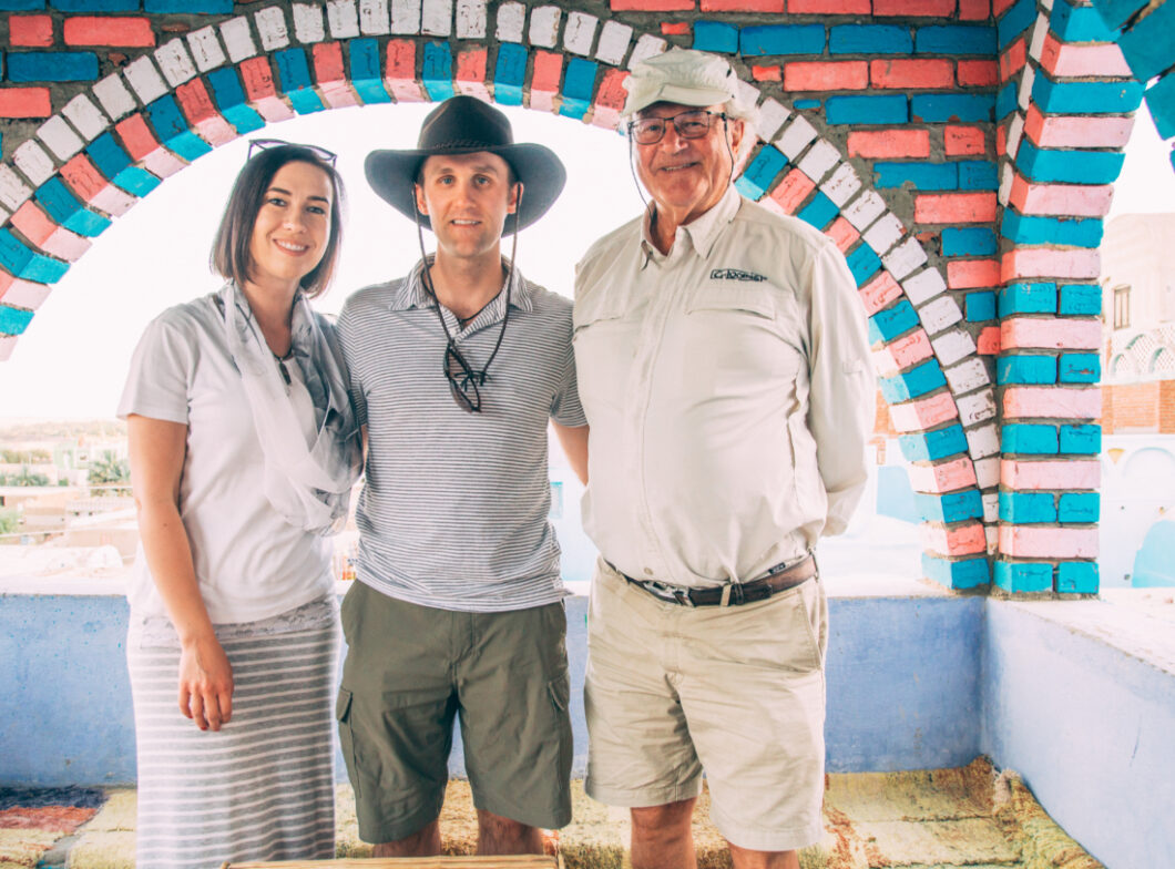 3 travelers posing for a photo in the Nubian Village in Egypt.