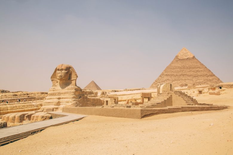 The sphinx and pyramids of Giza on clear sunny day in Cairo, Egypt