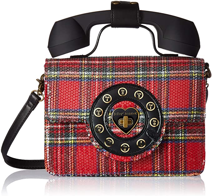 This Betsy Johnson novelty handbag is designed to look like a phone. The body of the bag is a red sequined flannel pattern, the clasp is a dial phone router, and the handle is a telephone.