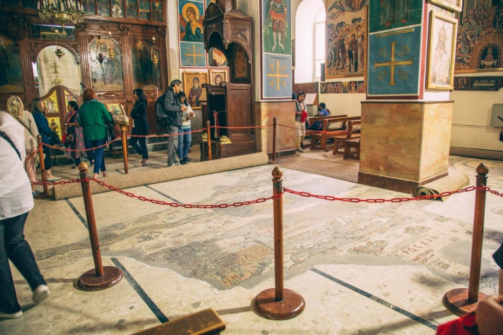 A group of people are standing in St George church.