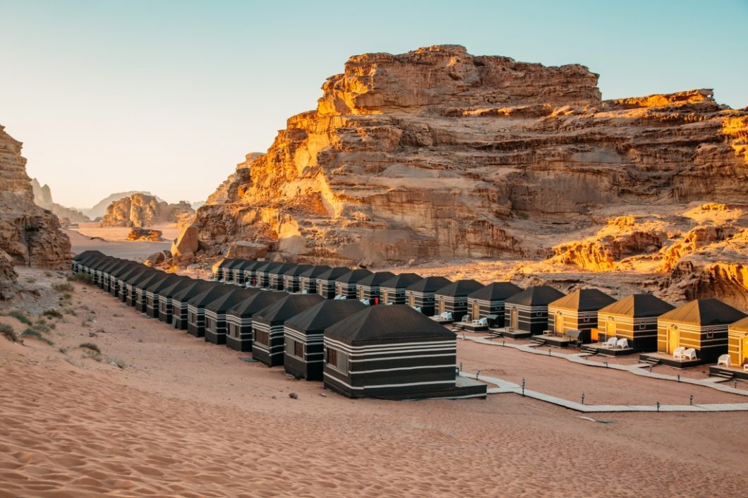 Different tents in a line in Wadi Rum Luxury Desert Camp