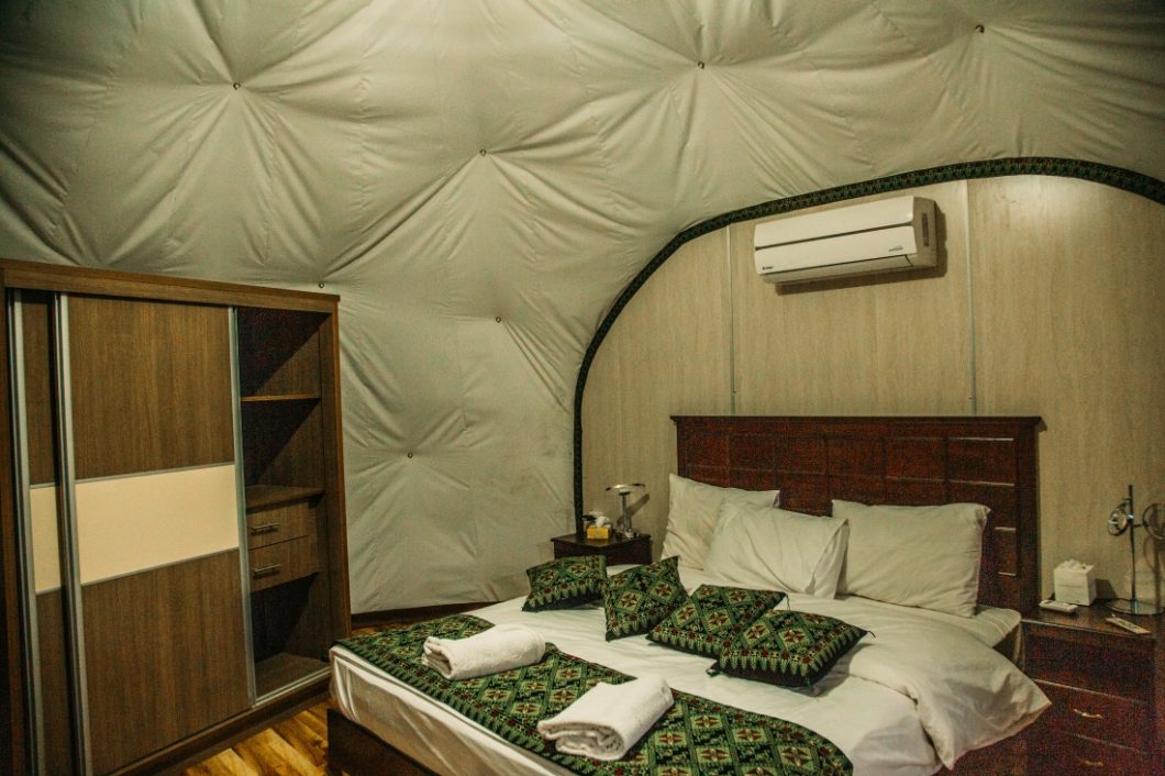 Mazayen Rum Camp inside view, luxury bedroom with closet and air conditioner