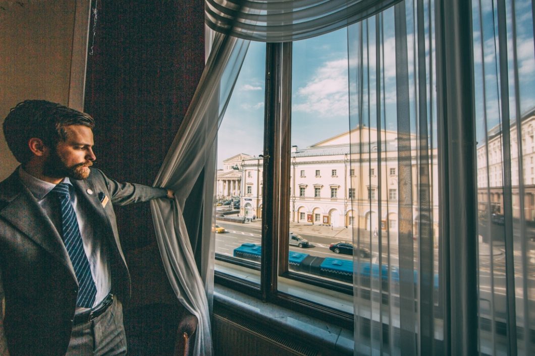 Daniel pulls back a curtain, revealing the view of the Bolshoi Theatre -- the same view The Count would have had from his suite in A Gentleman in Moscow.