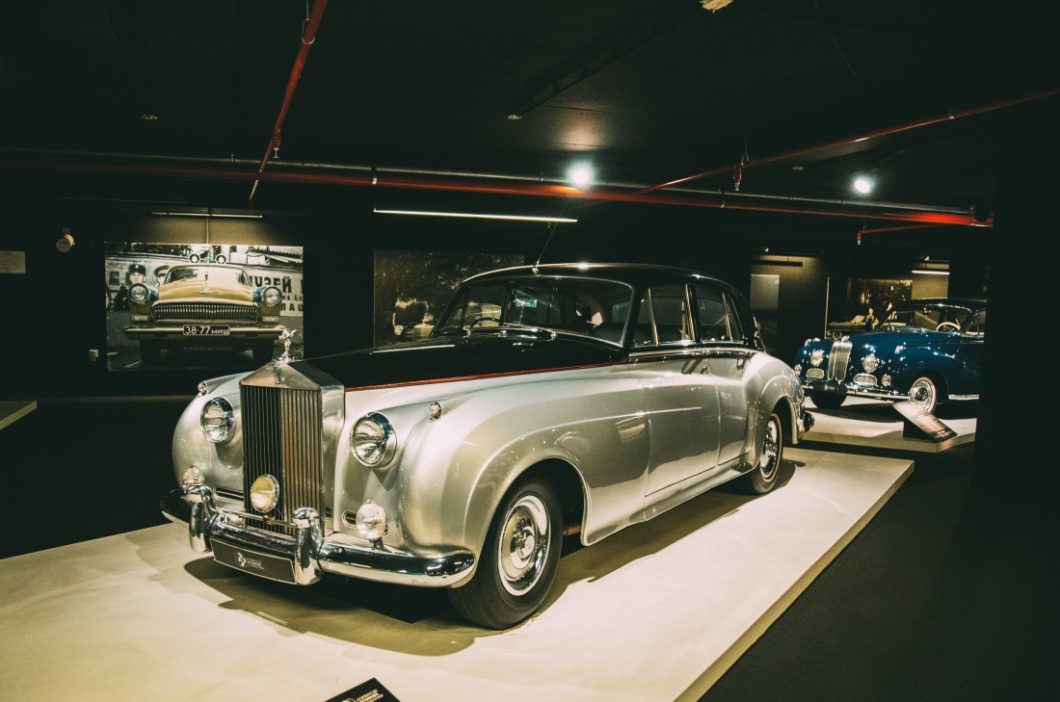 A stunning silver and black Rolls-Royce Silver Cloud, which was a James Bond 1980s car, on display at the Heydar Aliyev Center's Classic Car Exhibit in Baku, Azerbaijan.
