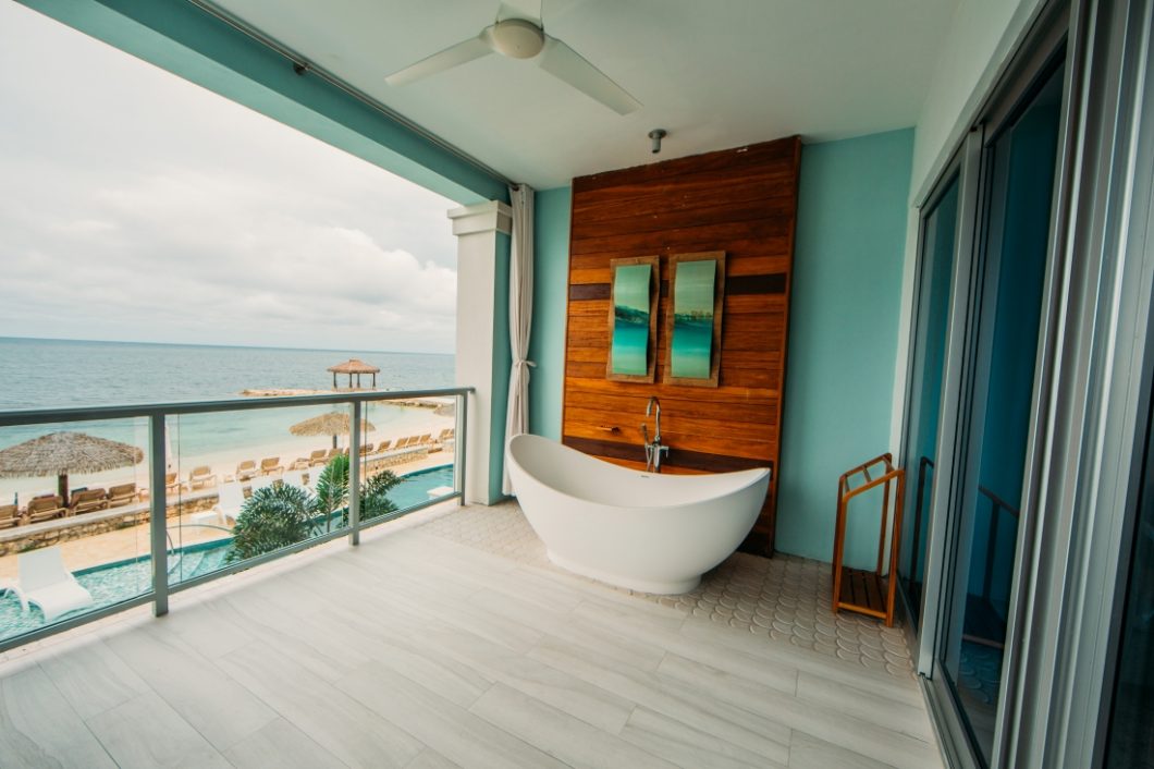 soaking tub on a room's second floor balcony at sandals resort