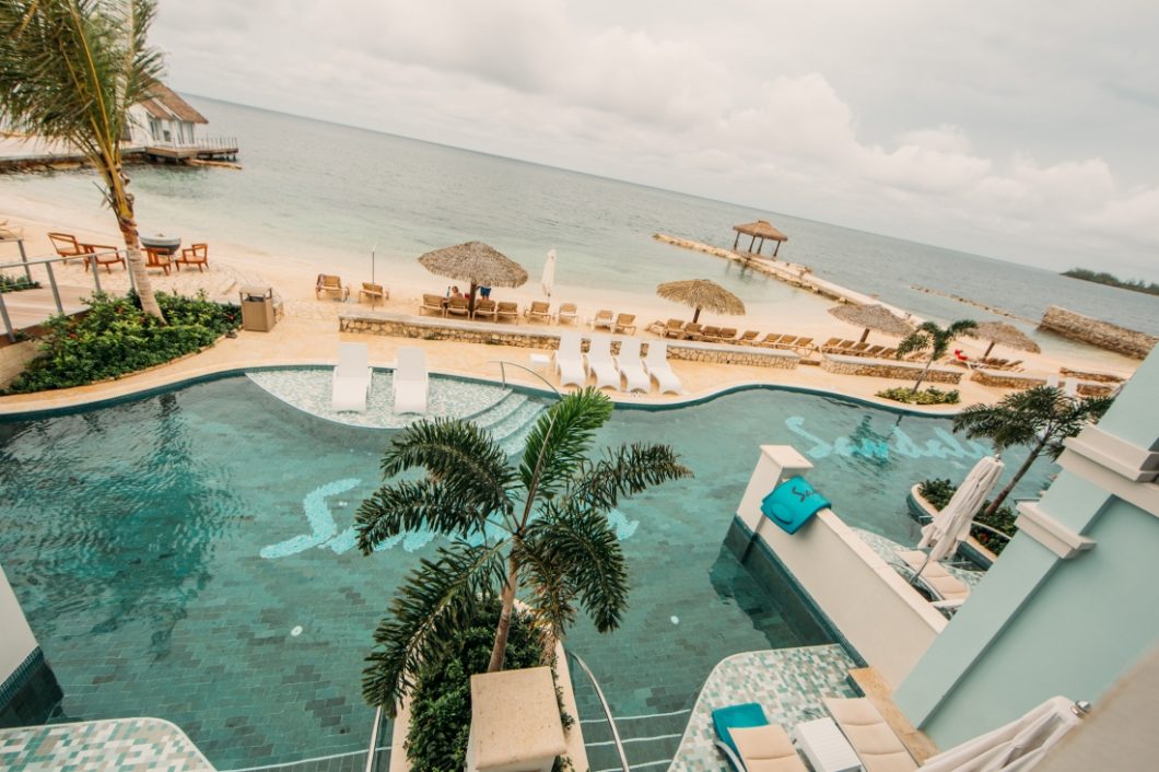 A view of the Sandals Montego Bay pool and beach from our room's balcony.