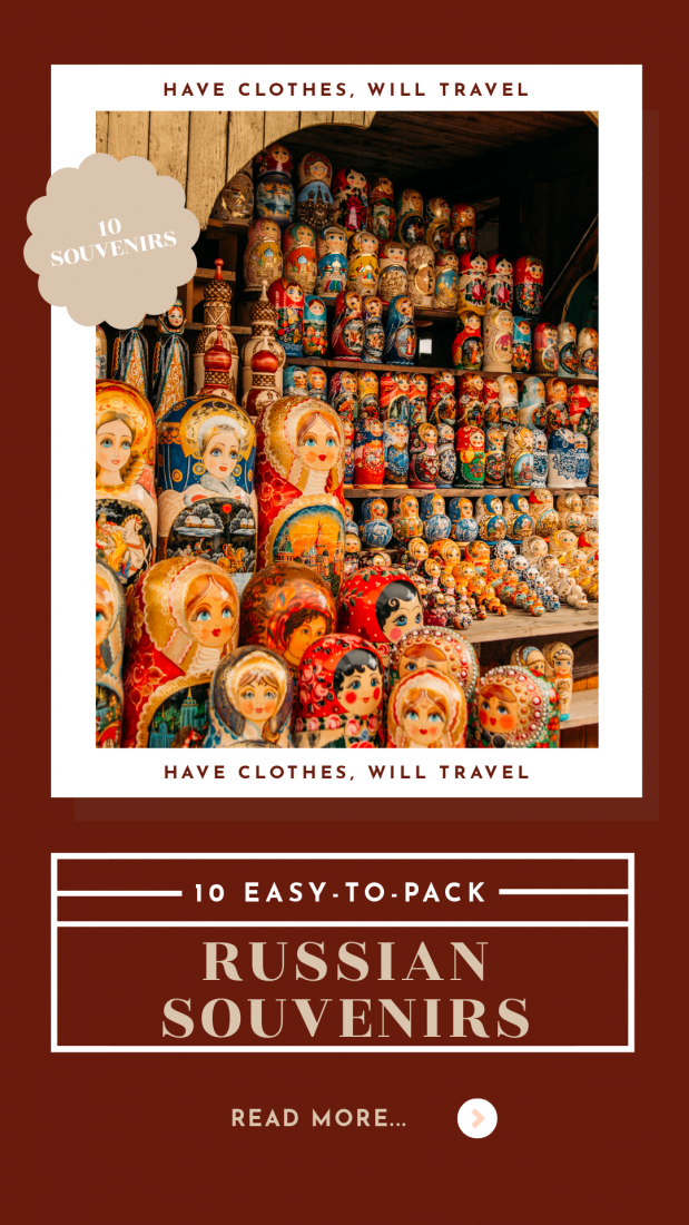 A graphic shows an image of Russian dolls on sale at a street market. The graphic is a deep maroon background color and features white text that reads "10 easy to pack Russian Souvenirs"