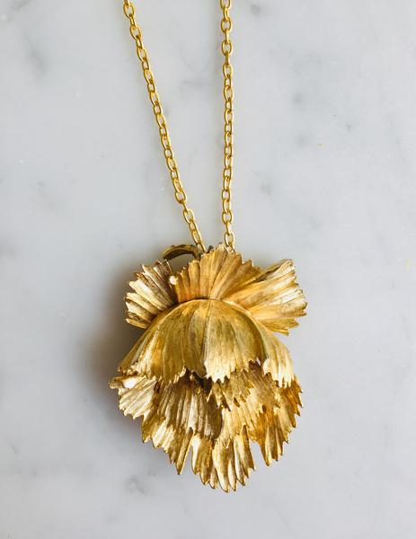 Brutalist style flower, circa 1940s, delicate yet bold. 18ct gold plate, and gold chain.