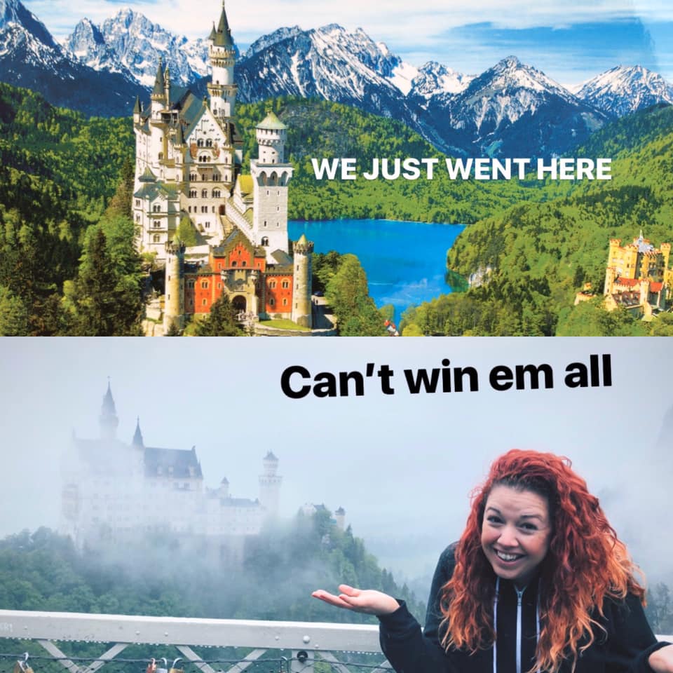 Two photos of Neuschwanstein Castle. The top is a picturesque view of the castle in the lush green valley next to a blue lake and snow-capped mountains. The bottom image is of a woman shrugging, posing in front of the castle that's partially obscured by fog.