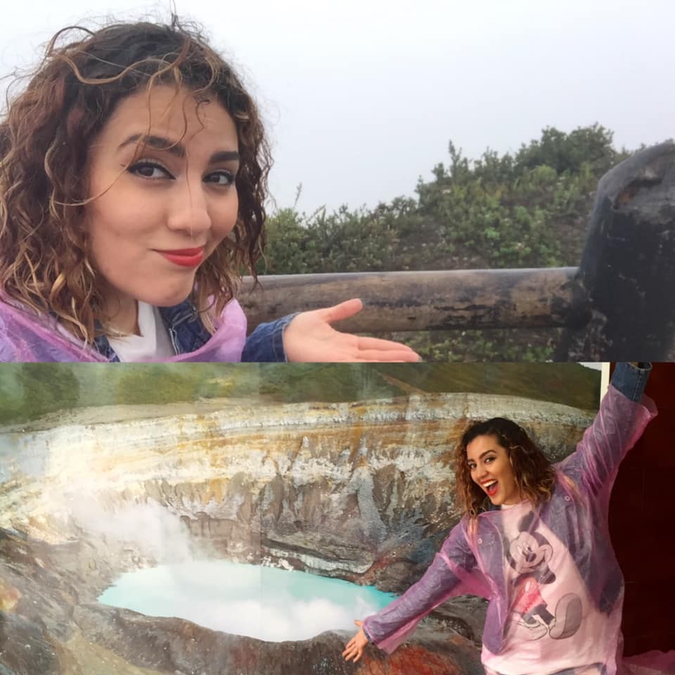 A set of two images of a young woman. In the top image, she poses at the ridge of the Poás Volcano in Costa Rica, but the view is obscured completely by fog. In the bottom image, the woman poses with a billboard of what the view into the volcano should look like.