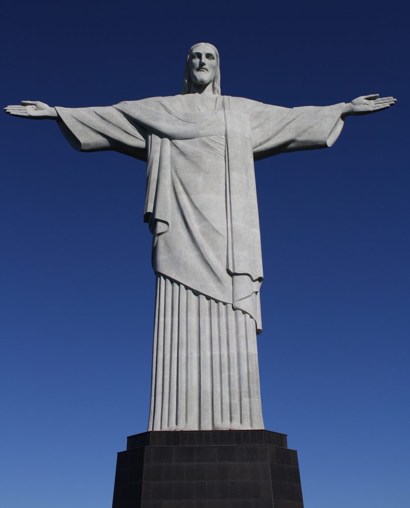 A clear image of the Christ the Redeemer statue in Brazil on a sunny day with clear blue skies.