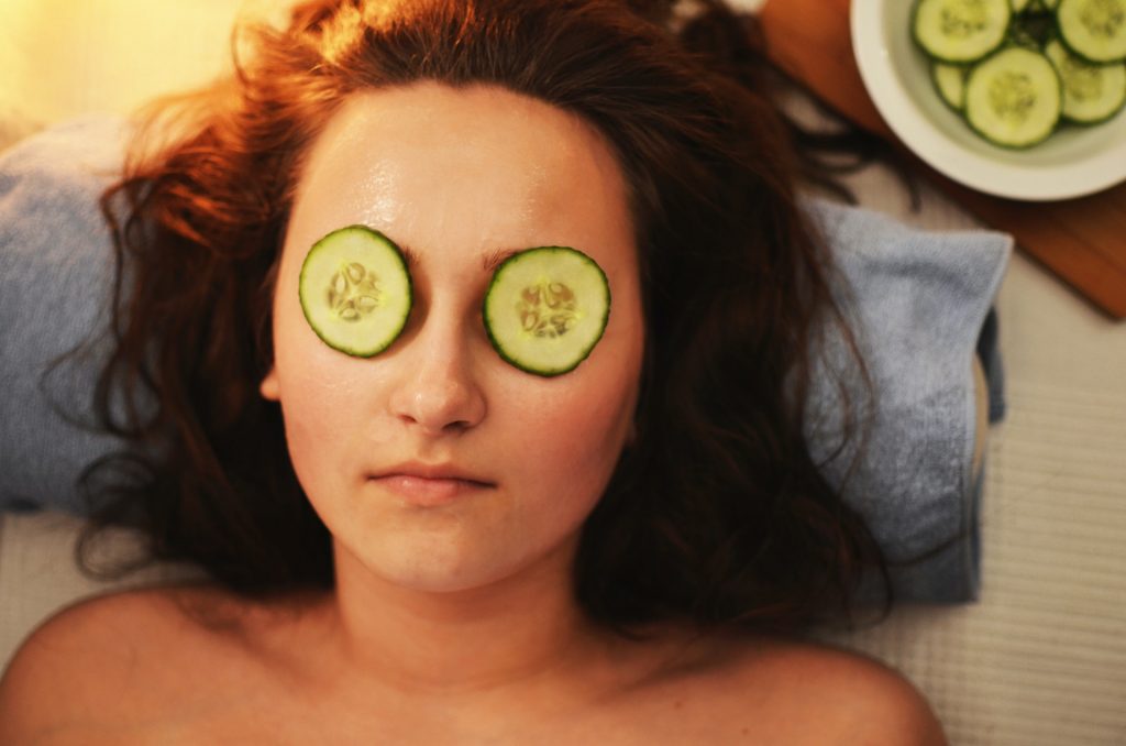 DIY spa day - use cucumber slices to depuff your eyes