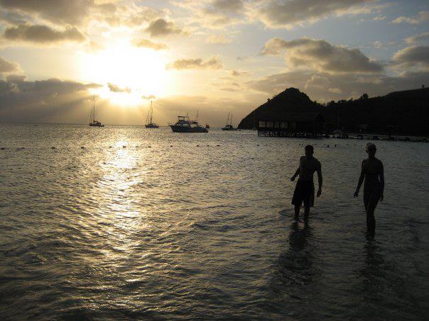 My husband & me enjoying a sunset at Sandals Grande St. Lucian.