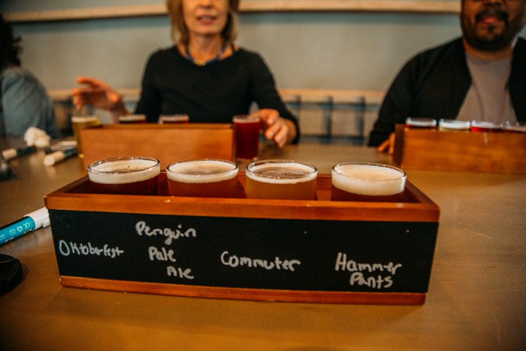 My flight of beer at One Barrel Brewing Co (don't mind my handwriting lol).