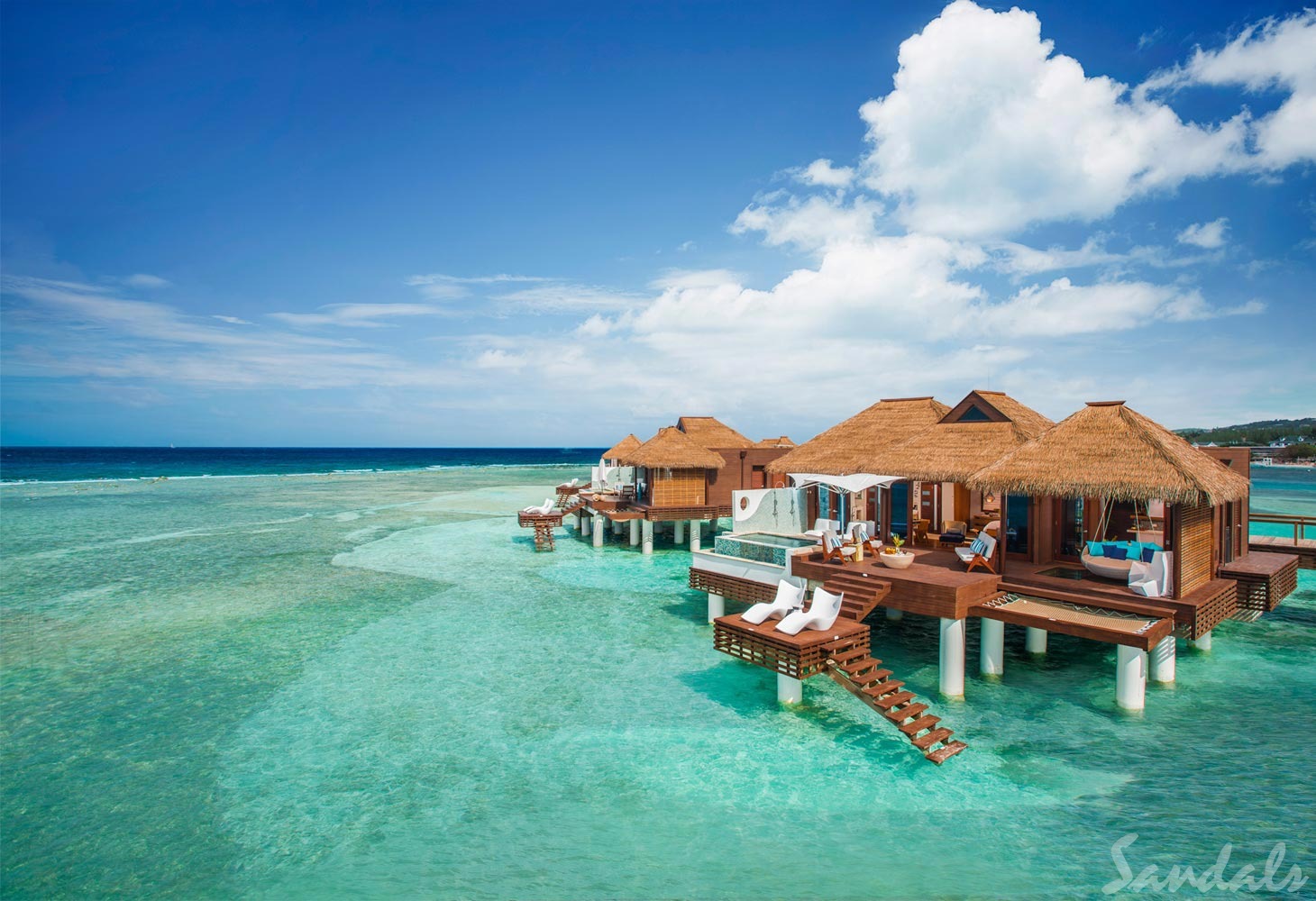 Sandals Royal Caribbean & Private Island overwater villas  with private pool and lounge chairs