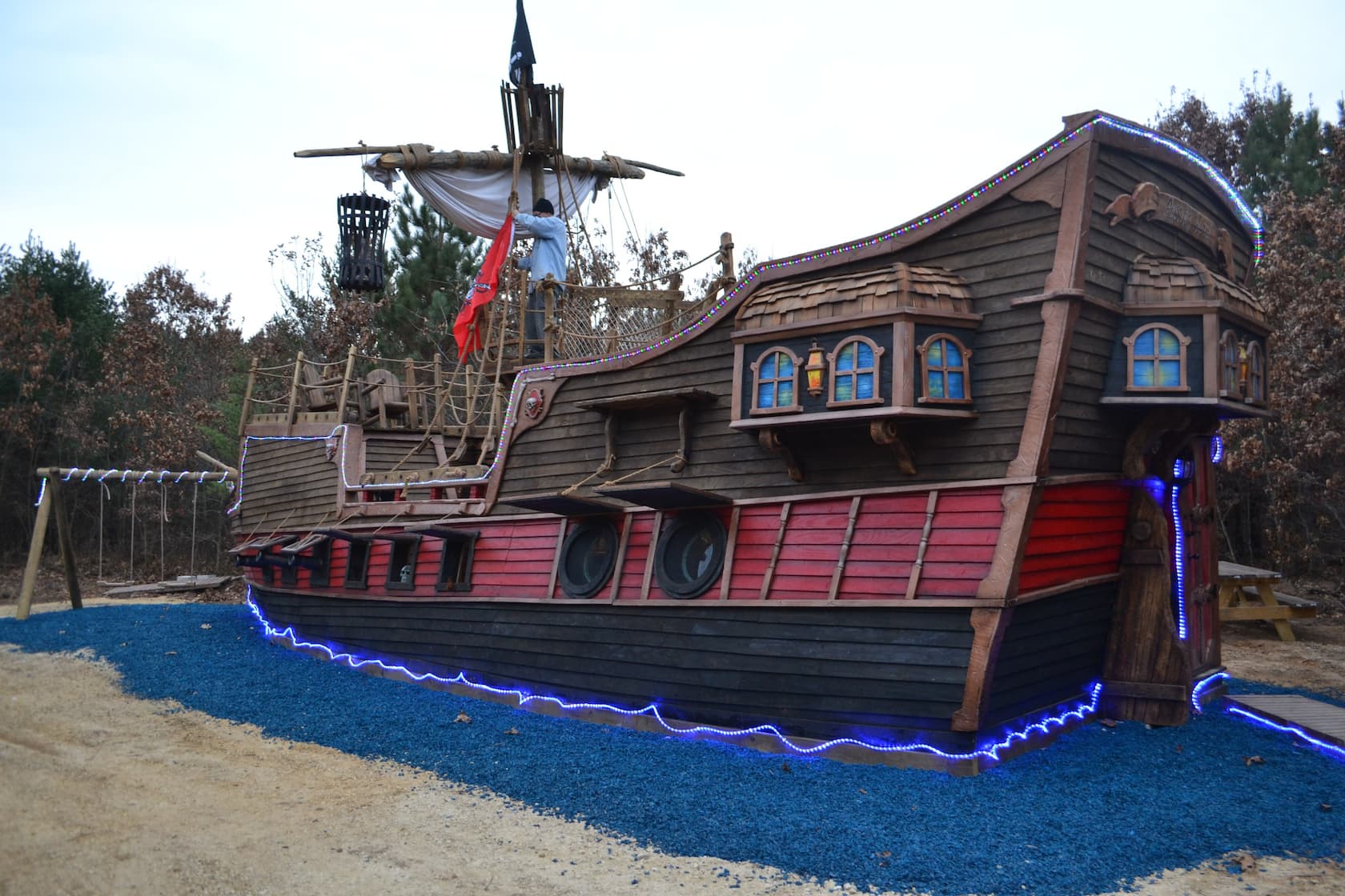 The exterior of a novelty pirate ship cabin that can be rented in the Wisconsin Dells.