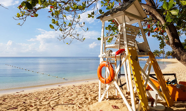 A lifeguard tower overlooks the shoreline on the beach at the Half Mood Resort near Montego Bay, Jamaica.