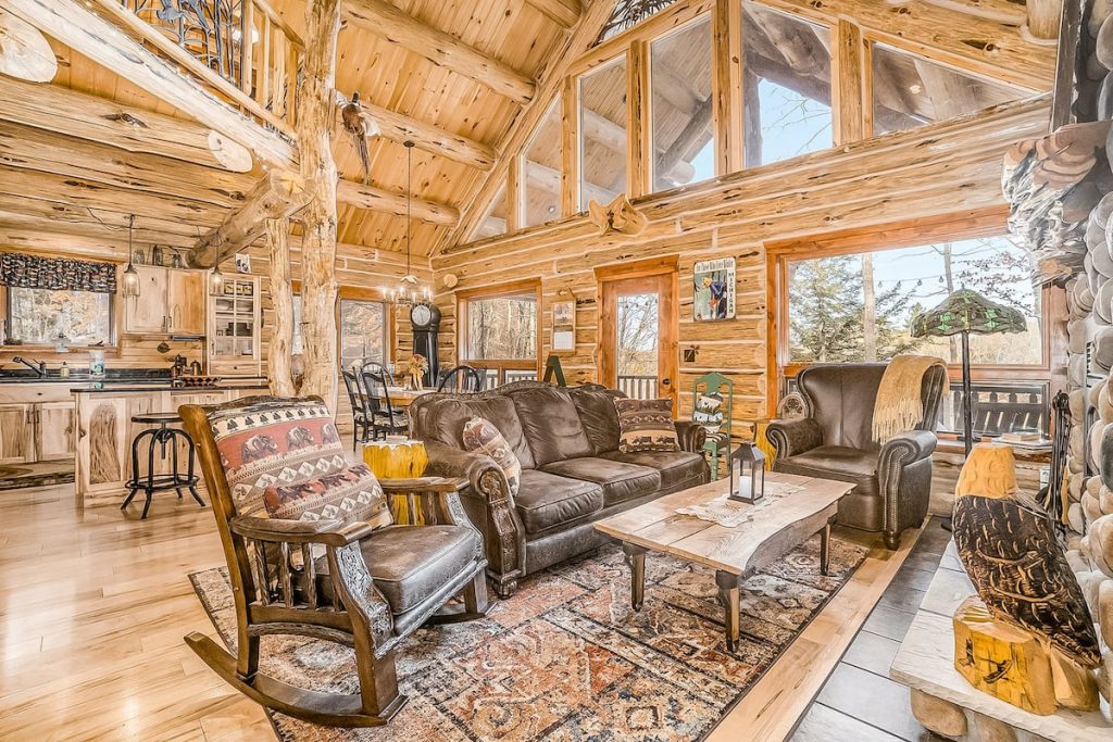 Delightful riverfront cabin w/ wood-burning fireplace and private gas grill!