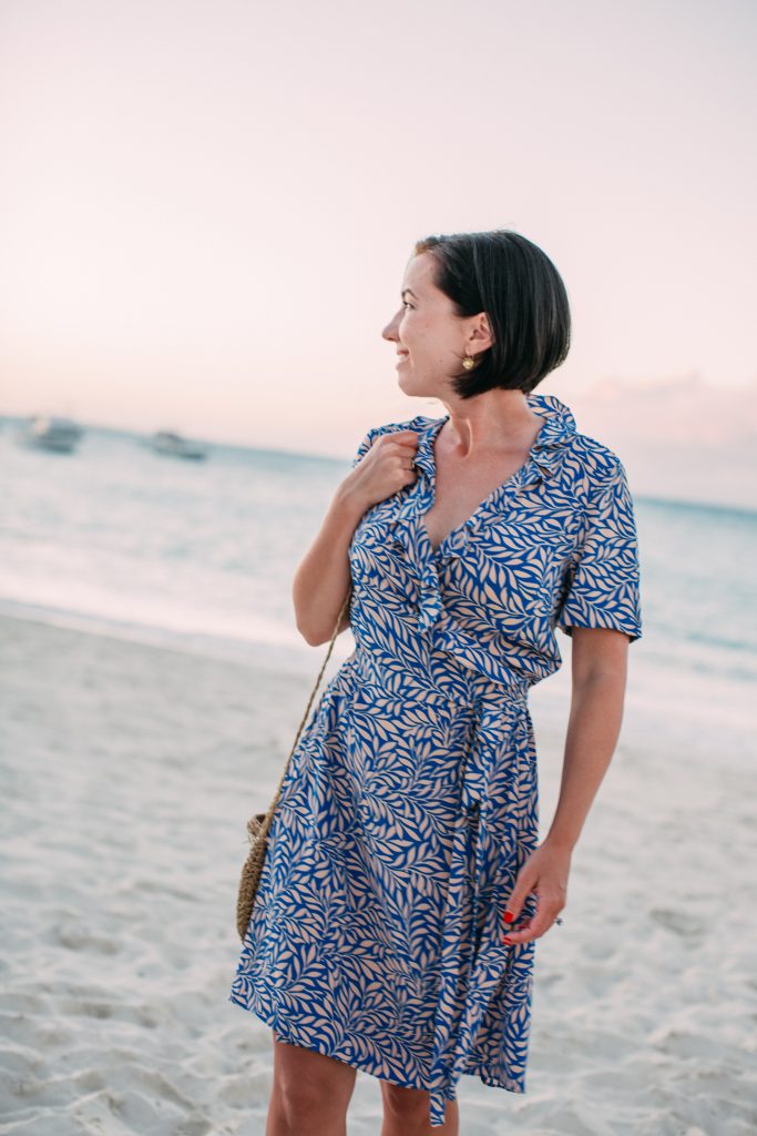 A woman wearing a Diane Von Furstenberg Wrap Dress in Turks and Caicos