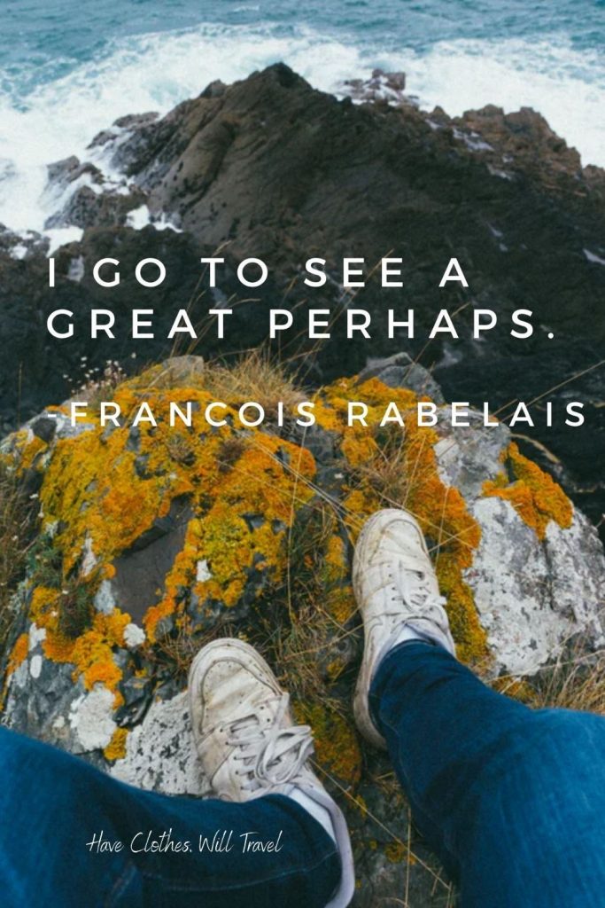 An image of a rocky shoreline, looking down off moss-covered cliff. A pair of feet rests on the rocks. White text over the image says, 