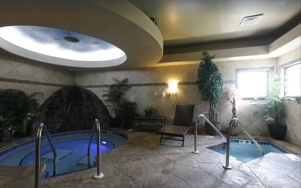 Two small indoor hot tubs and spas located in a luxury lakefront condo rental in the Wisconsin Dells.