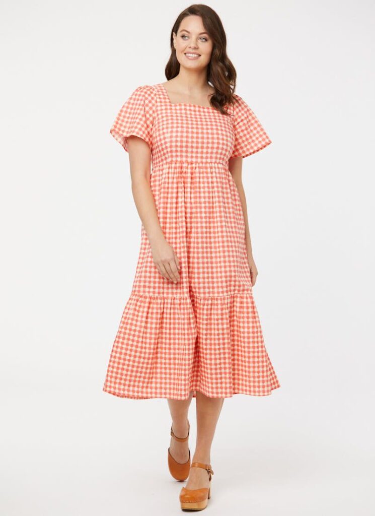 Model Wearing a Georgia Gingham Square Neck Dress - Coral