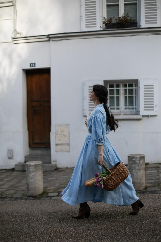 Model Walking and Wearing Little Women's Cottagecore Inspired Linen Dress