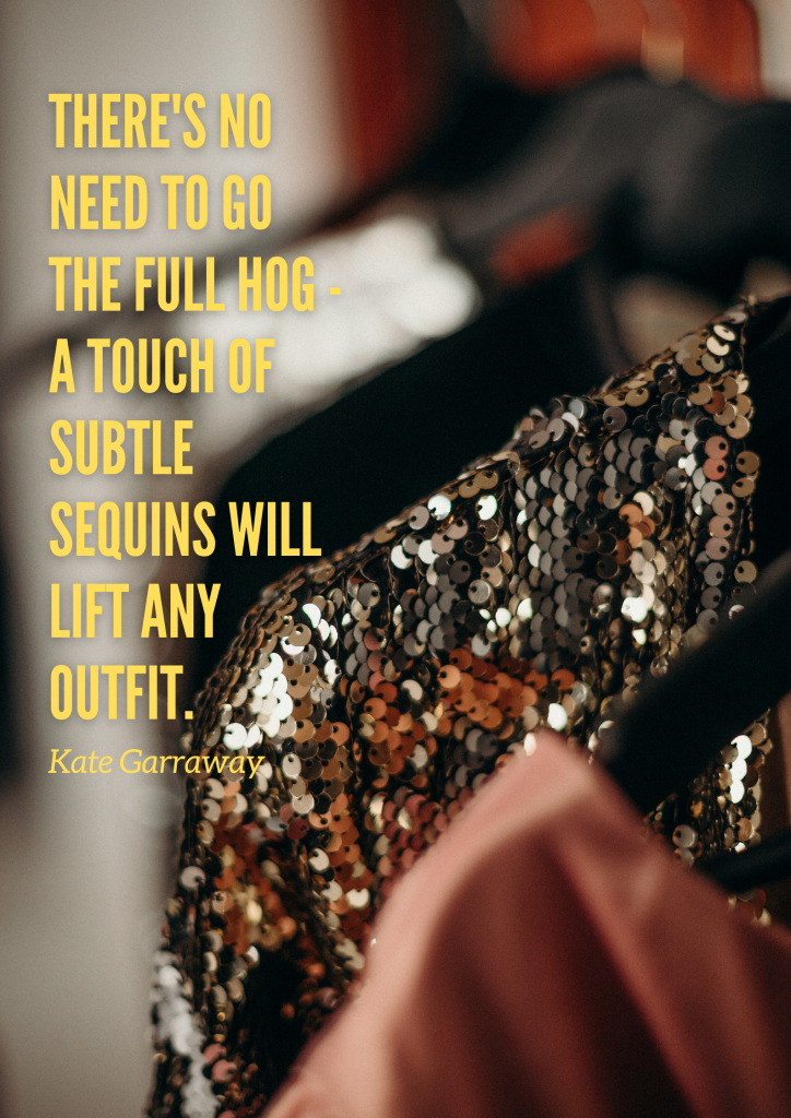 A sparkling, gold-sequined dress hangs on a clothing hanger. Yellow text over the image reads, "There's no need to go the full hog - a touch of subtle sequins will lift any outfit. - Kate Garraway"