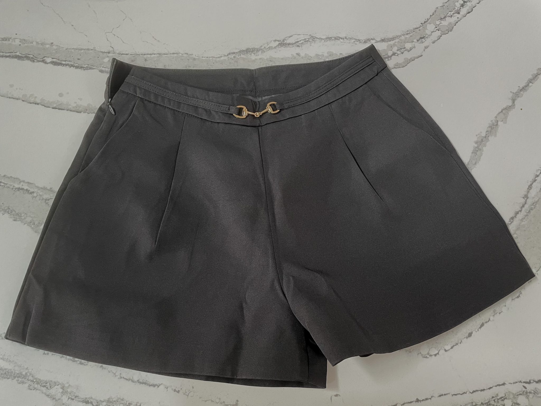 Horsebit Side Pockets Shorts in Black from Chicwish.