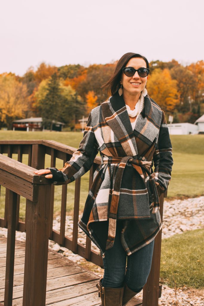 A woman wearing a Prairie Check Rabato Coat by Chicwish.