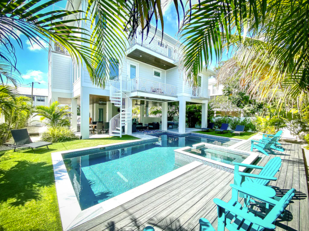 Beautiful 7 bd luxury home just steps away from the AMI beach! Pool, Spa + Rooft