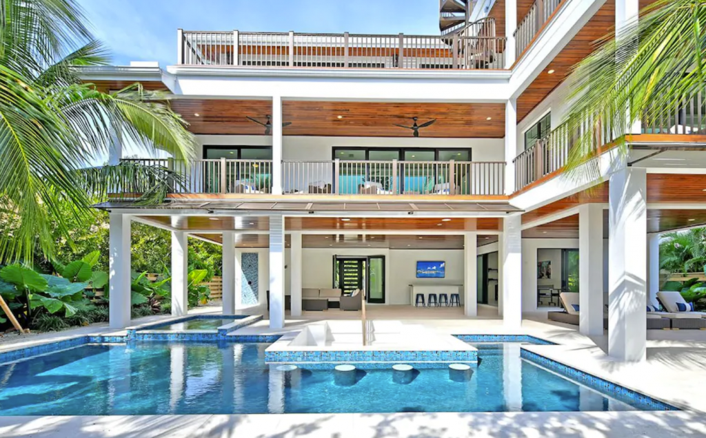 Dream vacation! Gorgeous canal front luxury home, pool, spa and rooftop deck!