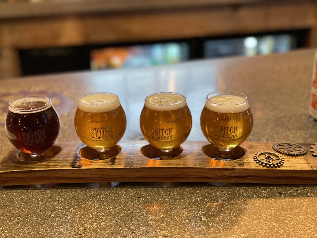 A flight of four beers - one dark beer and three light beers - at the SwitchGear Brewing Co. in Elkhart Lake.