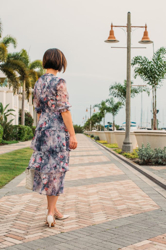 The back of my Floral Printed Chiffon Tiered Midi Dress by Marchesa Notte worn by Have Clothes, Will Travel