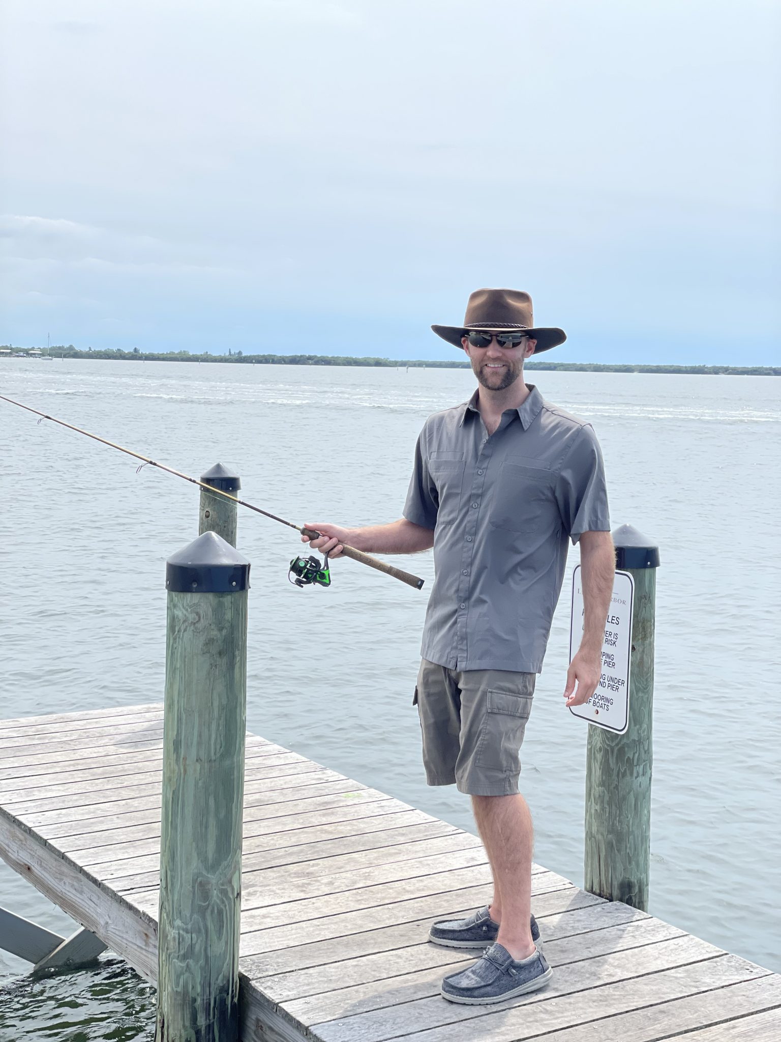 Fishing off the pier in Ruskin, Florida by Bahia Beach