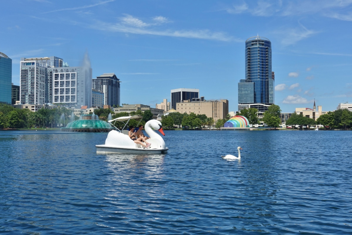 ORLANDO, FL -21 JUN 2020- View of swan boats at Lake Eola Park, a central lake in downtown Orlando, Florida, United States.