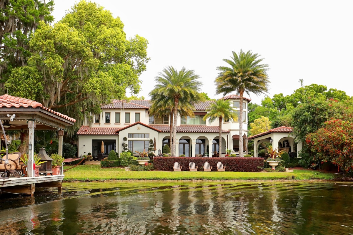 WINTER PARK, FLORIDA, USA: Beautiful home and boathouse in the Chain of Lakes as seen from a scenic boat tour on March 20, 2021.