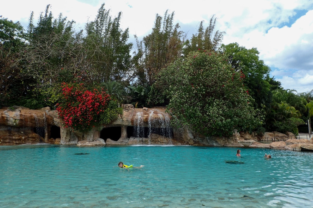 Orlando, FL USA - May 21, 2021: The lazy river pool and landscaping at Discovery Cove Park in Orlando, Florida.