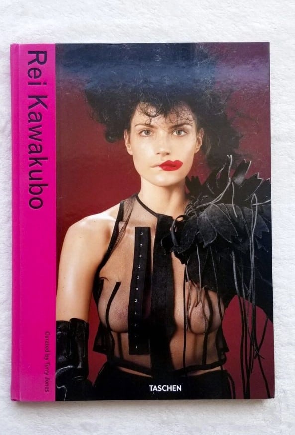 Hardcover fashion and designer book authored by Terry Jones titled Rei Kawakubo - COMME DES GARCONS Fashion Taschen Collectible with an avant-garde book cover design