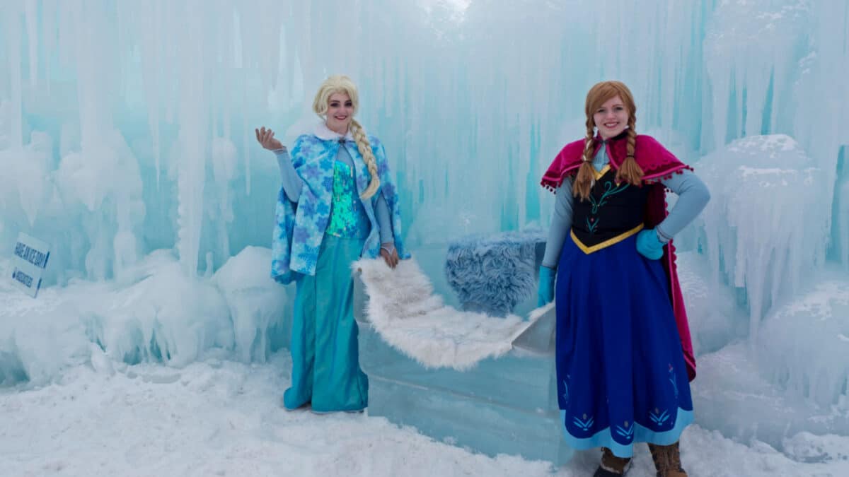 LAKE GENEVA, WISCONSIN - March 2, 2019: Charming female characters dressed as Anna and Elsa from Frozen at the annual ice castles winter attraction
