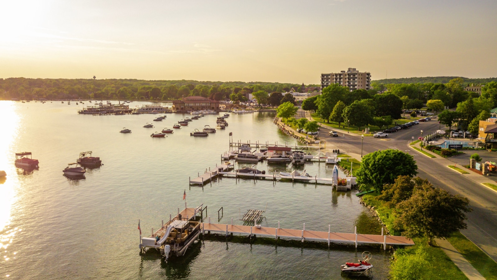 Aerial drone photo of boat piers and docks in Lake Geneva, Wisconsin.