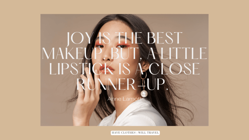 An image of a female model at a high fashion photo shoot. Text imposed over the image shares a makeup quote: "Joy is the best makeup. But a little lipstick is a close runner-up. – Anne Lamott"